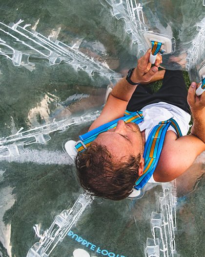 View from above of a player lying in his bubble